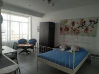 Postel nebo postele na pokoji v ubytování Studio Apartment Near the Beach