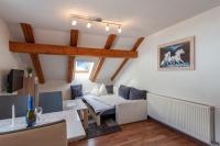Televízia a/alebo spoločenská miestnosť v ubytovaní Appartement 204