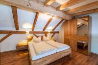 Łóżko lub łóżka w pokoju w obiekcie Maisonett - Appartement 205