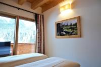 Posteľ alebo postele v izbe v ubytovaní Apartment Grünstein