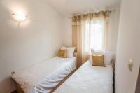 Posteľ alebo postele v izbe v ubytovaní House Suzi1
