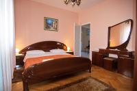 Posteľ alebo postele v izbe v ubytovaní Apartment and Rooms Toka