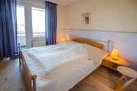 Postel nebo postele na pokoji v ubytování FeWo Vaupel - Nr 27 - Strandhotel