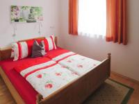 A bed or beds in a room at holiday home Emberger, Fügen