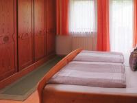 A bed or beds in a room at holiday home Emberger, Fügen