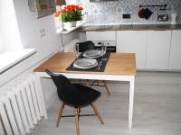 Kuchyňa alebo kuchynka v ubytovaní Elektoralna Warsaw Apartment