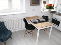 Kuchyňa alebo kuchynka v ubytovaní Elektoralna Warsaw Apartment