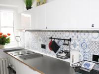 Kuchyňa alebo kuchynka v ubytovaní Elektoralna Warsaw Apartment