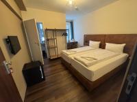 Hotel Capitol Zentrum - 24h -にあるベッド