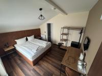 Hotel Capitol Zentrum - 24h -にあるベッド