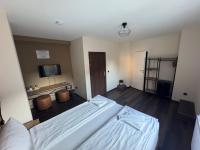 Hotel Capitol Zentrum - 24h -にあるベッド