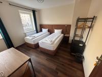 Hotel Capitol Zentrum - 24h -にあるベッド