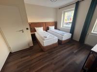 Hotel Capitol Zentrum - 24h -にあるベッド