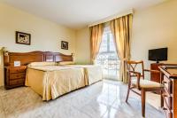 Postel nebo postele na pokoji v ubytování Roma Aurea