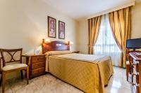 Postel nebo postele na pokoji v ubytování Roma Aurea