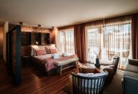 Postel nebo postele na pokoji v ubytování Boutique Hotel Das Rivus