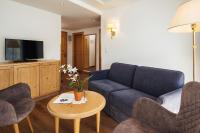 Telewizja i/lub zestaw kina domowego w obiekcie Hotel Garni Alpenruh-Micheluzzi