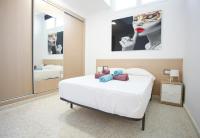 A bed or beds in a room at Albatros Playa Club