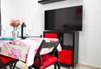 A television and/or entertainment centre at Albatros Playa Club