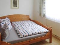 A bed or beds in a room at holiday home Emberger, Fügen