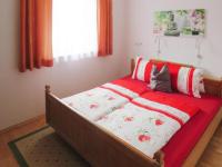 A bed or beds in a room at holiday home Emberger, Fügen