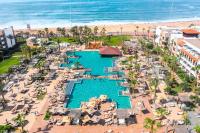 an aerial view of a resort with a pool and the beach at Hotel Riu Palace Tikida Agadir - All Inclusive in Agadir