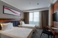 Postel nebo postele na pokoji v ubytování Ramada by Wyndham Gaziantep