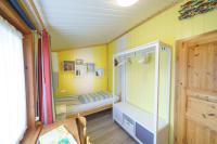 Postel nebo postele na pokoji v ubytování Ferienhaus Strandkorb