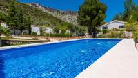Bazén v ubytovaní Villa Las Gayumbas Villanueva de la Concepcion by Ruralidays alebo v jeho blízkosti