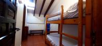 Postel nebo postele na pokoji v ubytování Albergue La Posada Cangas de Onis