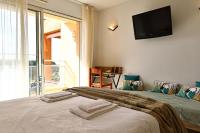 Posteľ alebo postele v izbe v ubytovaní T2 Dolce Vita - Vue Mer, Piscine & Plage