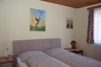 A bed or beds in a room at Haus Gerstbauer
