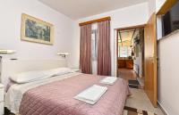 Posteľ alebo postele v izbe v ubytovaní Rooms Bale 2150