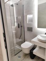 A bathroom at Vacations in Patra Studios