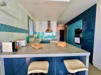 Kuchnia lub aneks kuchenny w obiekcie PGH N9- Vue Mer, 100m de la Plage & Parking Privé
