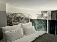 Łóżko lub łóżka w pokoju w obiekcie MINT Boutique Studio Apartments