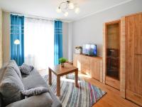 Televízia a/alebo spoločenská miestnosť v ubytovaní Holiday flat with a large terrace, Kolobrzeg