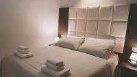 Posteľ alebo postele v izbe v ubytovaní Morin 10 Rome Exclusive Suites