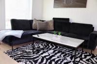 Posezení v ubytování Les Homes - Modern & Cozy Stay Near Oslo Airport