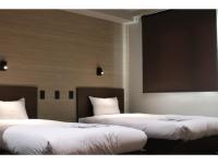 Fukuyama Royal Hotel - Vacation STAY 36222vにあるベッド