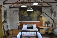 SOUSIE'S RUSTIC STAYにあるベッド