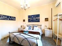 A bed or beds in a room at Attico Talenti