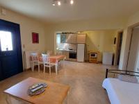 A kitchen or kitchenette at Ktima Pyroessa Apartments - Blue Apartment