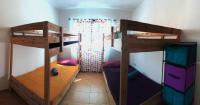 Posteľ alebo postele v izbe v ubytovaní Bhavana Surf House