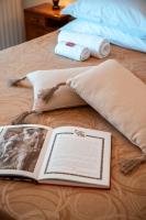A bed or beds in a room at Villa Punta del Sole