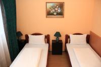 Posteľ alebo postele v izbe v ubytovaní Hotel Ózd