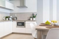 Kuchyňa alebo kuchynka v ubytovaní Apartment Masarska