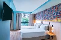 Een bed of bedden in een kamer bij ibis Styles Kuala Lumpur Bukit Bintang