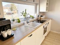 Kuchyňa alebo kuchynka v ubytovaní Apartament Górska Fantazja