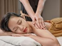 a woman getting a massage from a therapist at Hotel de l'Opera Hanoi - MGallery in Hanoi